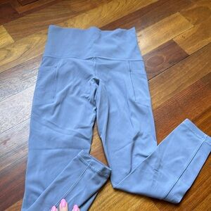 Athleta salutation stash pocket II 7/8